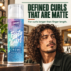 Man with long curly hair beside Foster the Curl Crème: defined curls that are matte, for curls longer than finger length