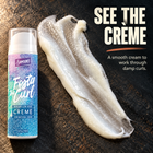 Foster the Curl Crème bottle beside a swipe of the curl cream, showing a smooth crème to work through damp curls