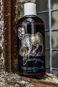 12 oz Premium Shampoo with new Bench-Leg logo, displayed on a weathered, rusted ledge.