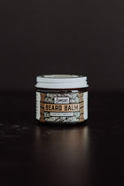 2 oz Beard Balm displayed against a black background.