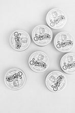 Load image into Gallery viewer, Overhead view of 1 oz hair pomades with the old logo spread out on white surface.